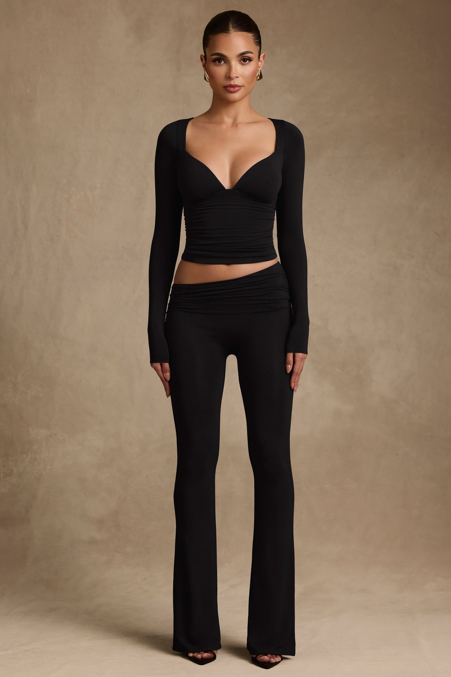 Modal Asymmetric-Waist Flared Trousers in Black